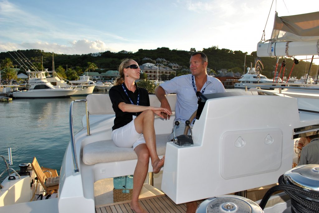 Worlds End Crewed Catamaran Party Guests at helm