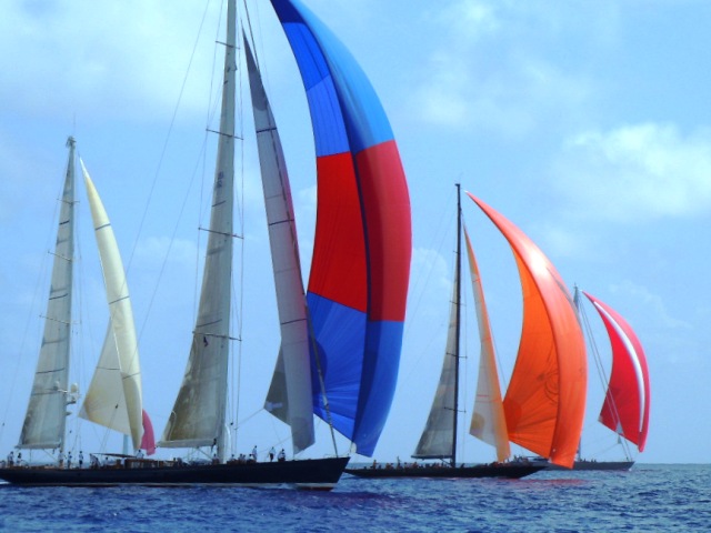 Regatta Racing Yachts Spinnakers in a close race finish