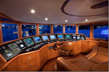 Luxury Charter Motor Yacht At Last Helm