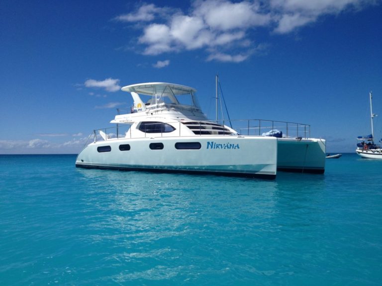Nirvana Luxury Crewed Charter Power Catamaran on water