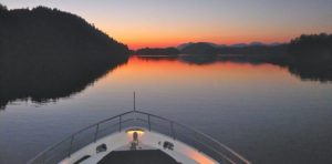 Alaska luxury yacht charter sunset