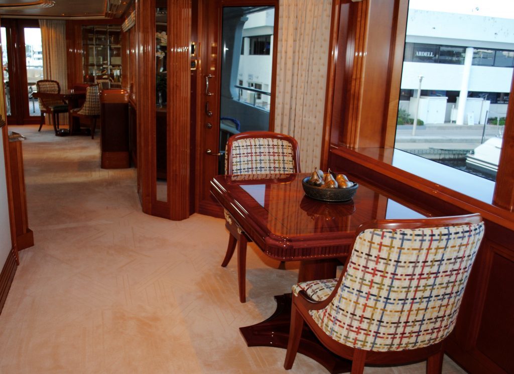 M/Y Harmony, crewed charter yacht has bridge deck table