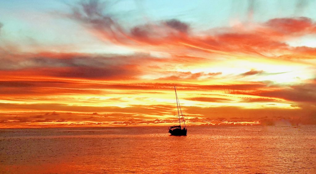 Grenadines sailing catamaran at Sunset